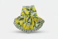 Pet dress with lemon and leaf pattern on a white background