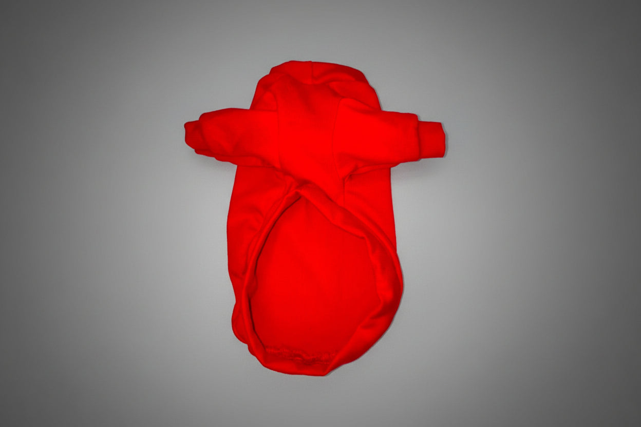 Red dog shirt on a white surface