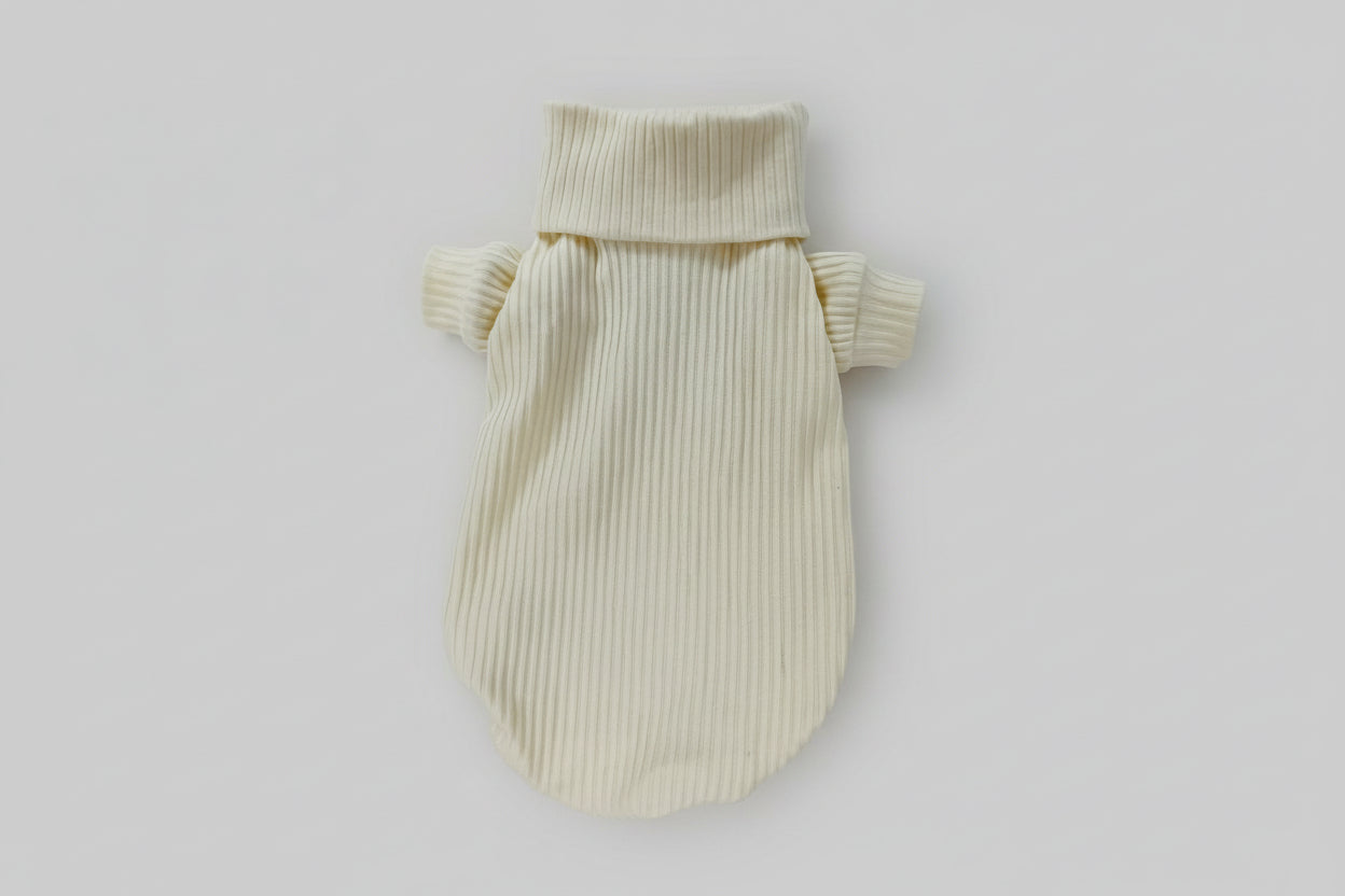 Beige knitted pet sweater on a white background