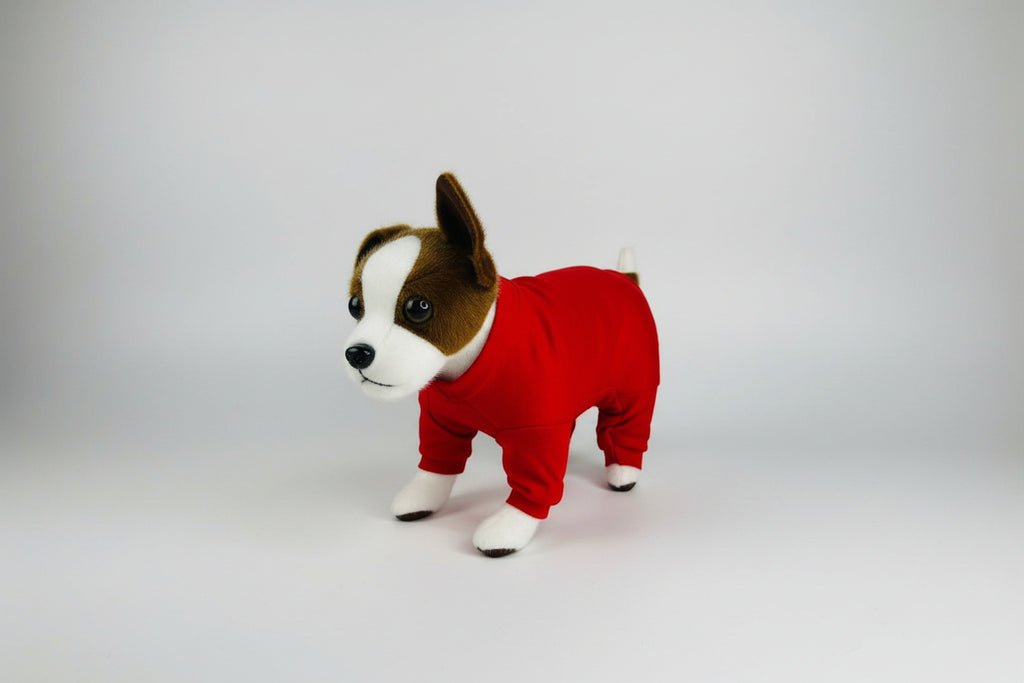 Plush dog toy wearing a red outfit on a white background