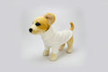 Stuffed dog toy wearing a white sweater on a white background