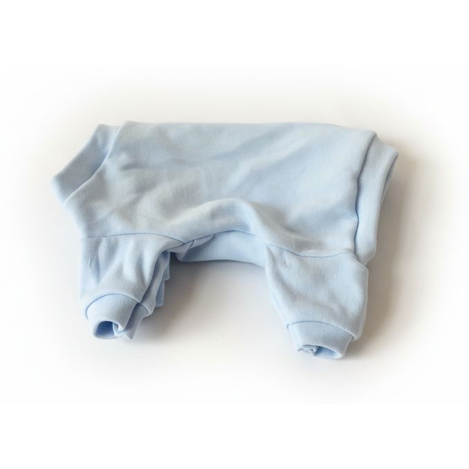 Blue dog pajamas on a white surface