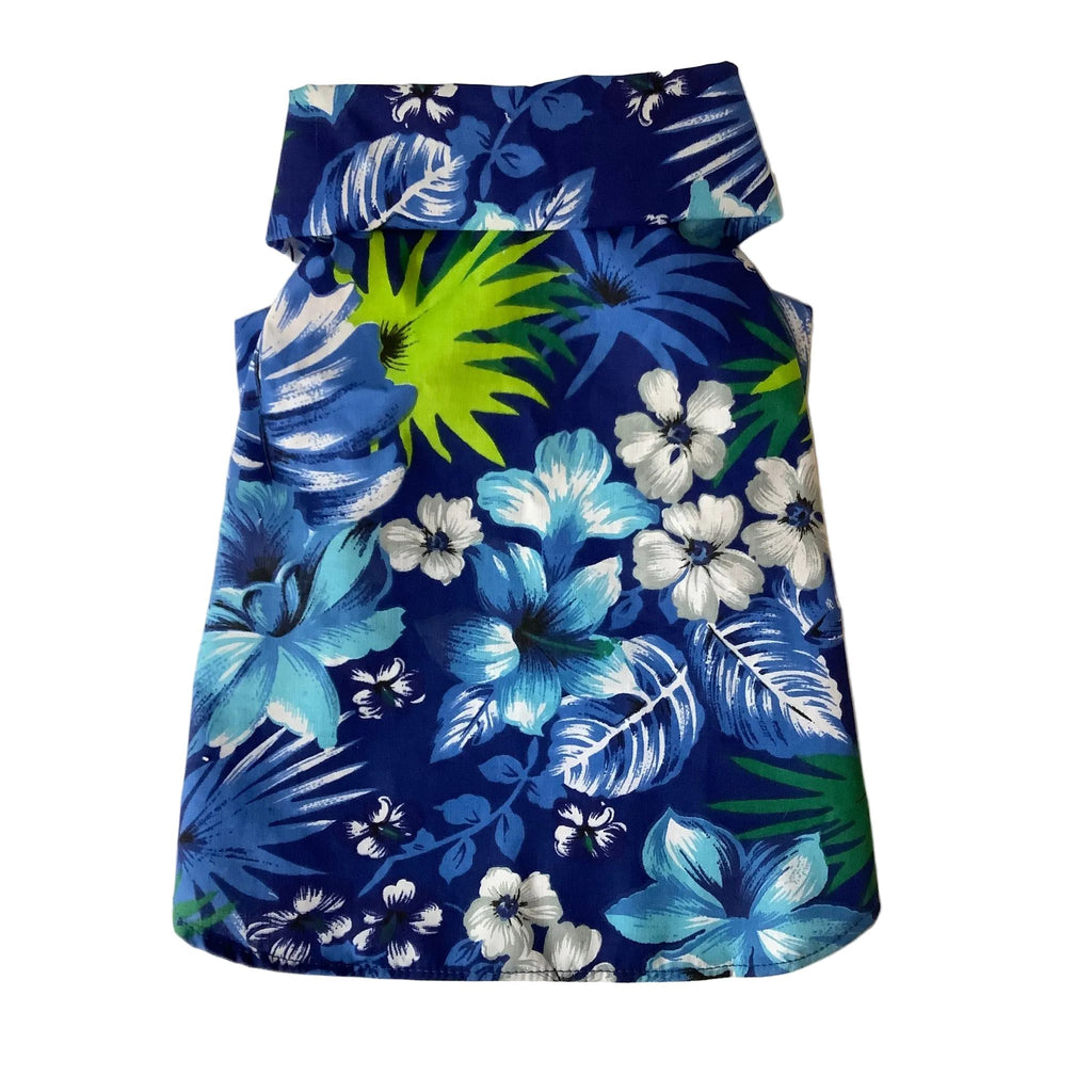 Blue Hawaiian Floral patterned fabric dog shirt with blue, green, and white flowers on a blue background