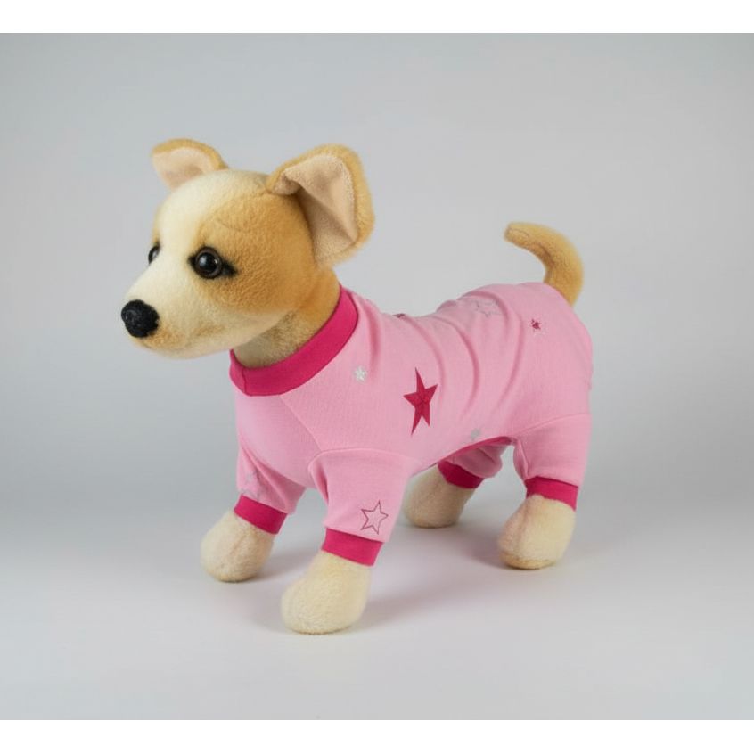 Plush dog toy wearing a pink outfit with star patterns on a white background