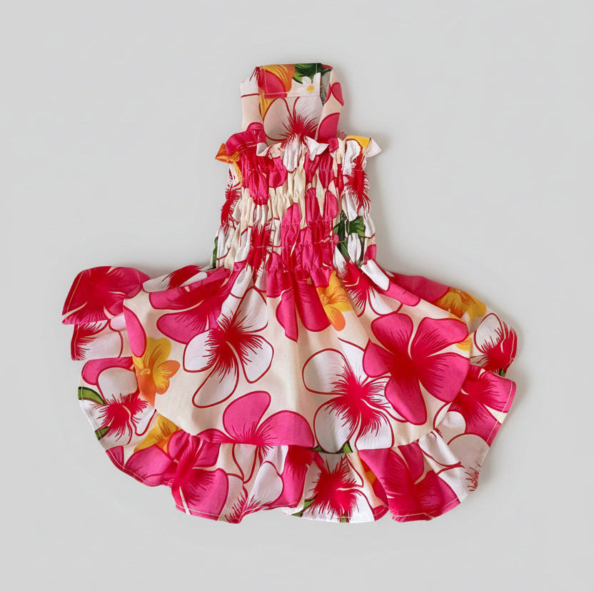 Floral dress with pink flowers on a white fabric background