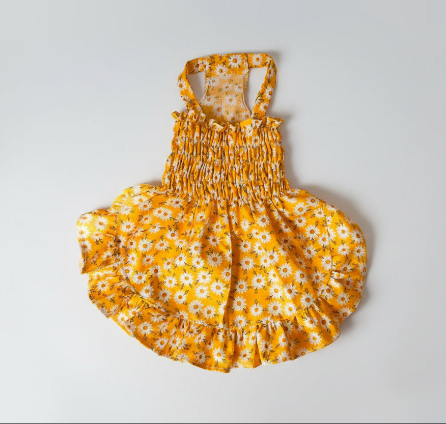 Yellow floral dress on a white background
