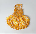 Yellow floral dress on a white background