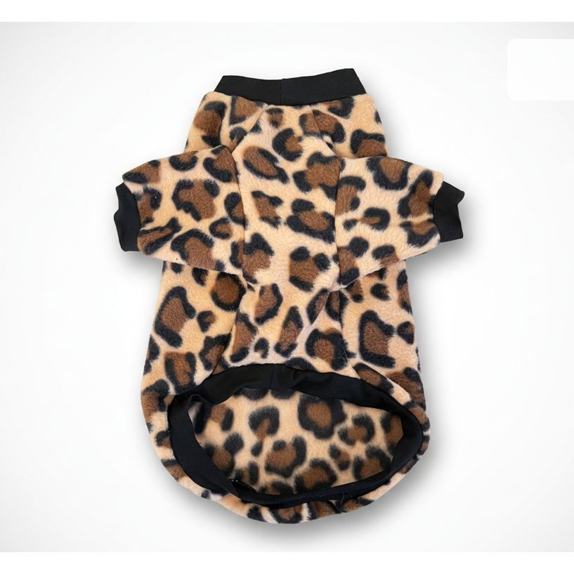 Leopard print dog coat on a textured beige background