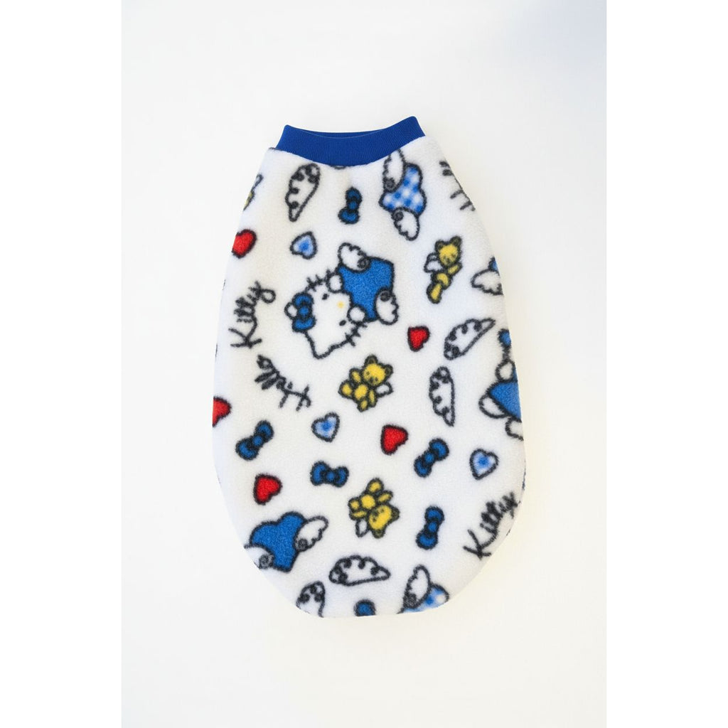 Hello Kitty-themed dog sweater on a marble surface