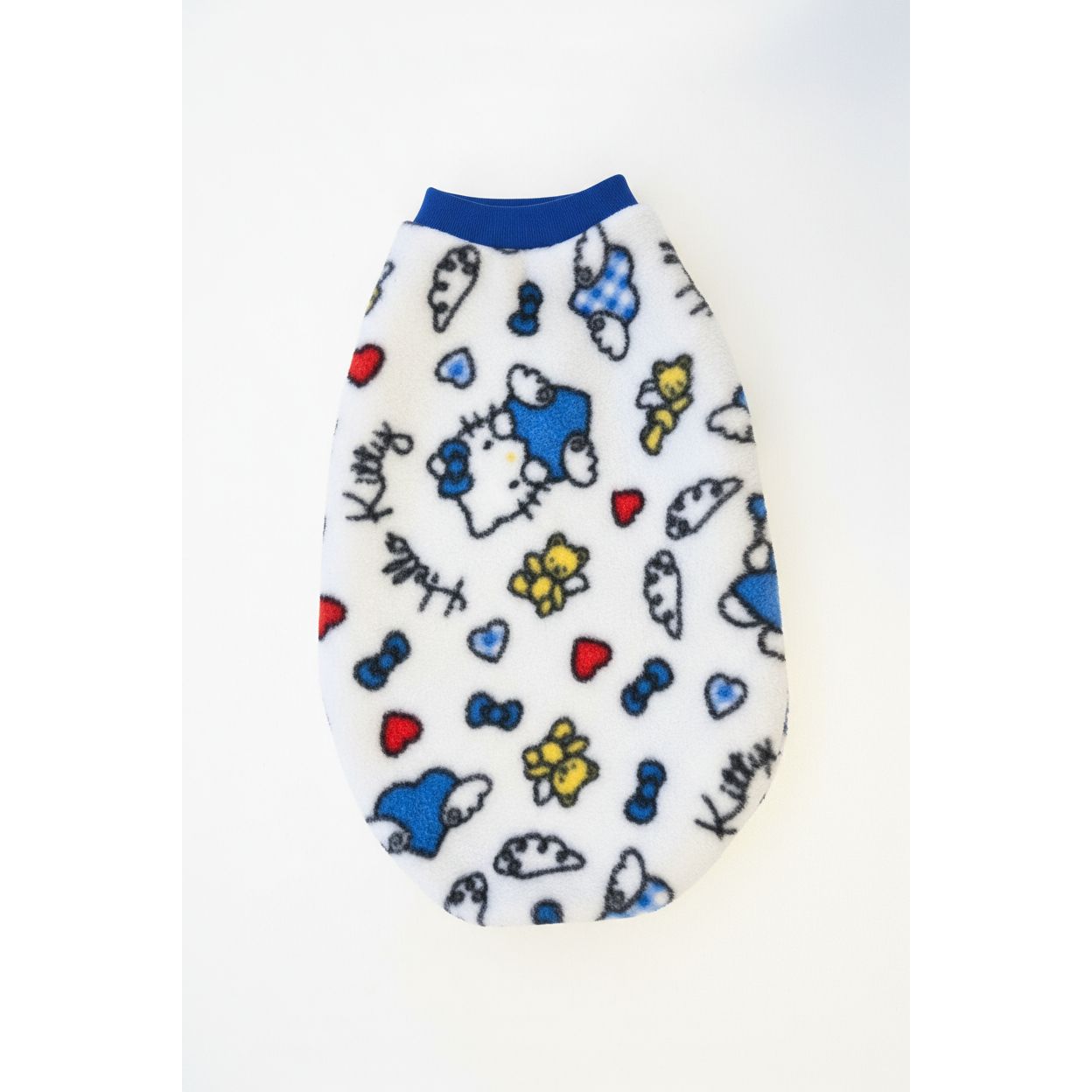 Hello Kitty-themed dog sweater on a marble surface