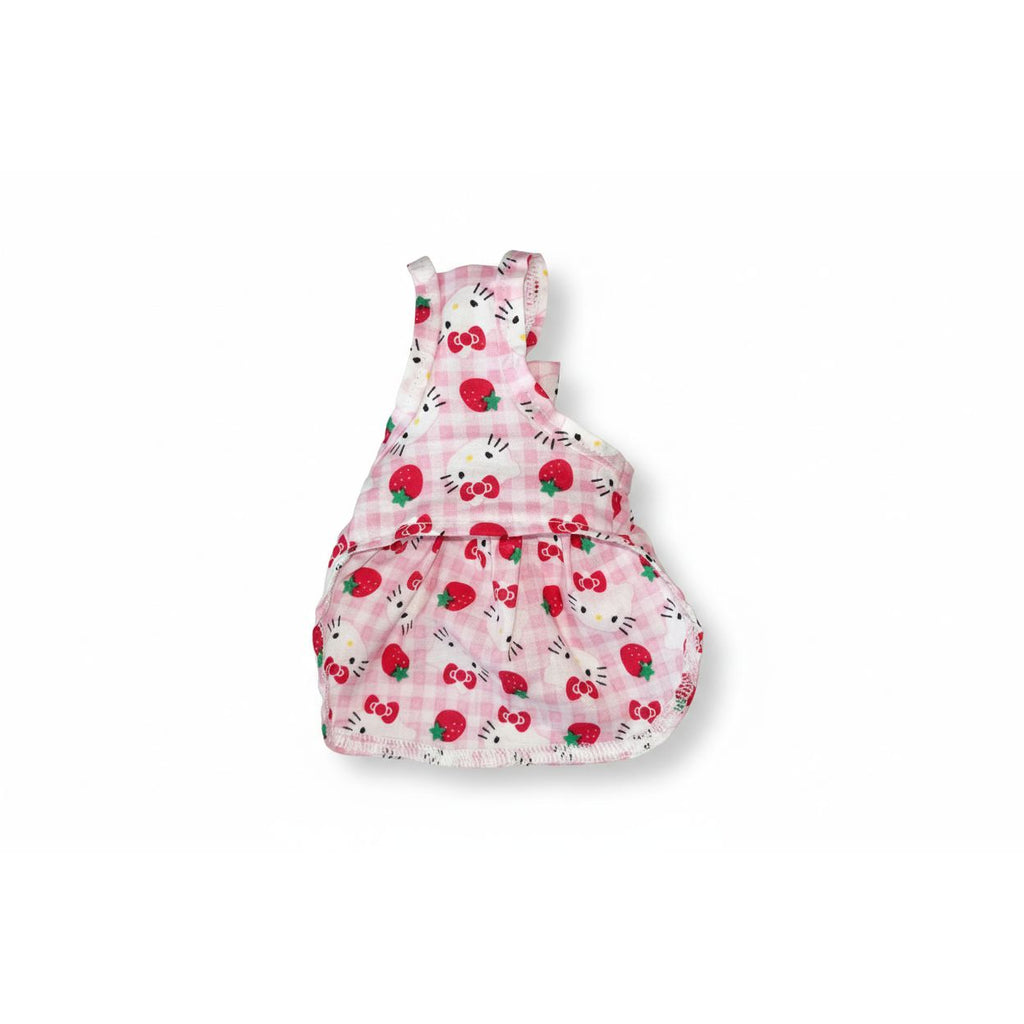 Pink checkered baby seat cover with Hello Kitty design on a gray surface