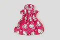 Pink dress with Hello Kitty pattern on a white background