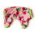 Floral-patterned dog pajamas on a white background